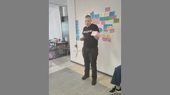 student presenting his work